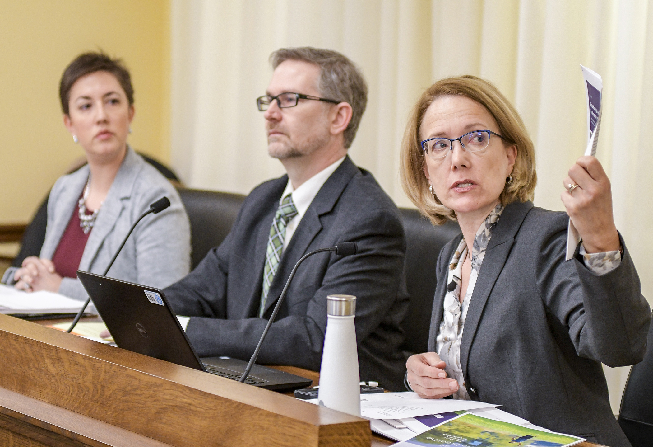 Greta Gauthier, right, assistant commissioner with the MPCA, testifies Jan. 22 before the House energy division. She is joined by State Energy Office Manager Jessica Burdette and Frank Kohlasch, PCA air policy/quality manager. Photo by Andrew VonBank